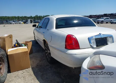 1999 Lincoln Town Car Signature из США, поврежденный, VIN 1LNHM82W6XY612217